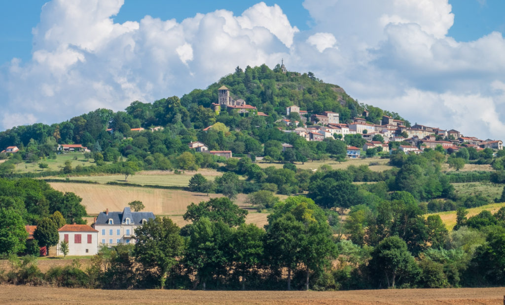Usson, perched on a volcanic butte further south in the Auvergne, is a member